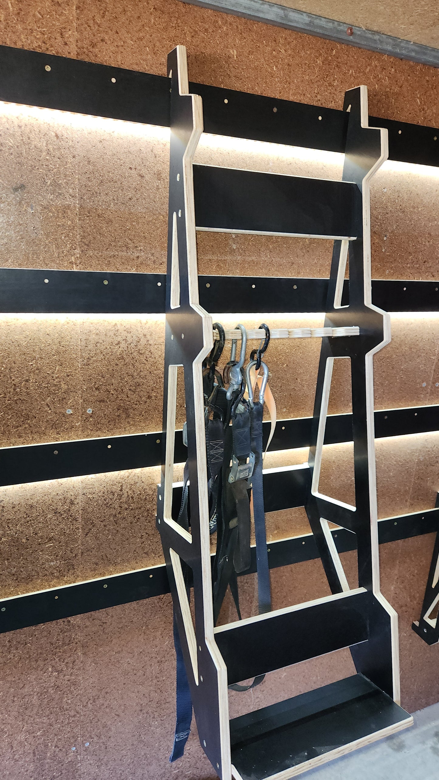 MX - loading ramp storage + tie down storage.
